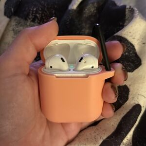 Apple AirPods with charging case and case cover